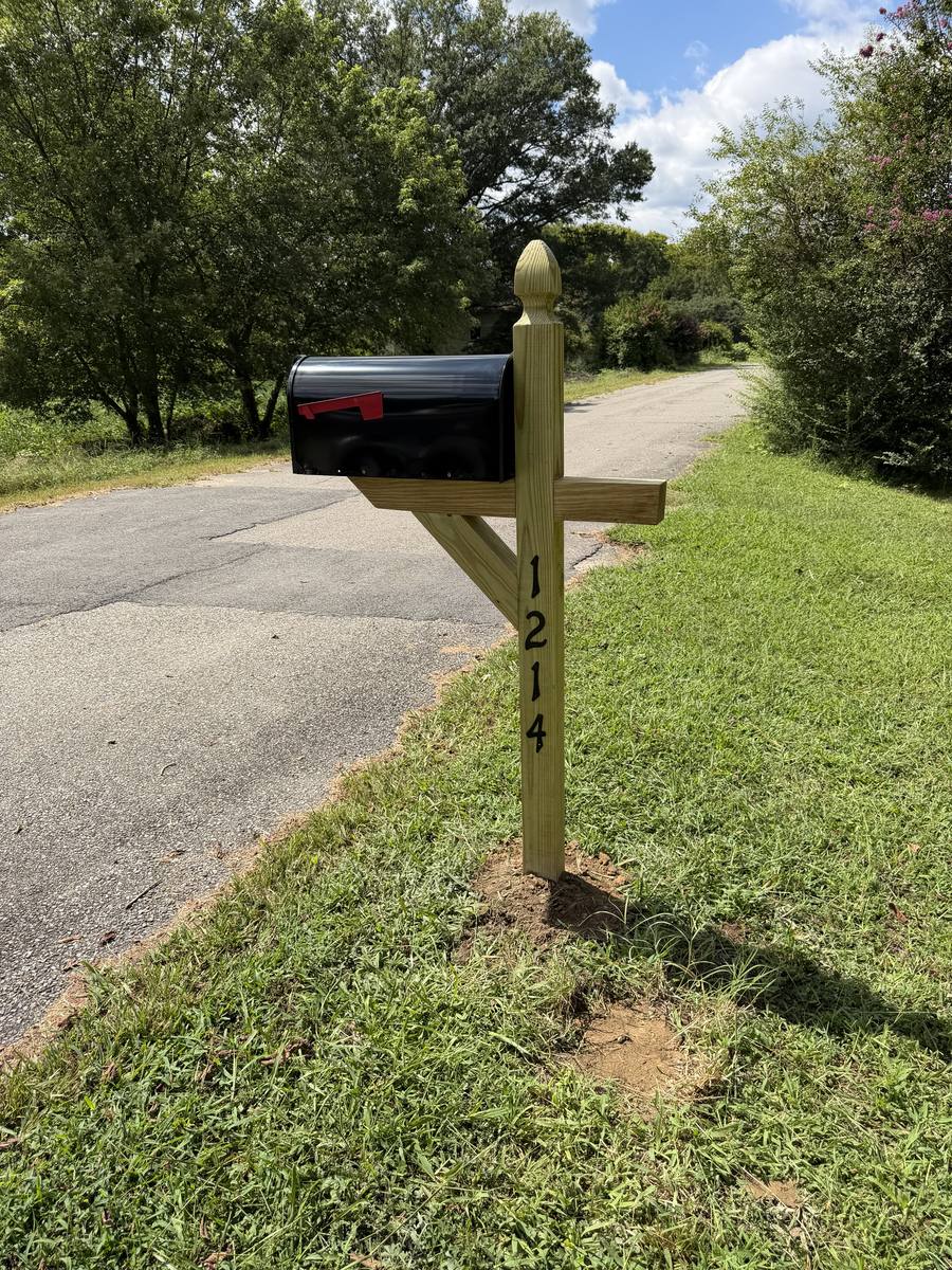 Standard mailbox replacement, acorn-top post on a rural road